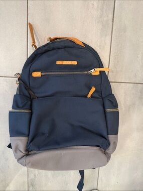 Tumi Navy and Gray Backpack with Tan Accents